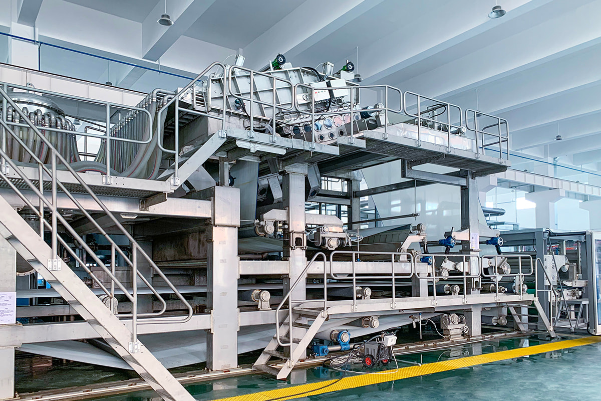 Wet-laid web forming machine